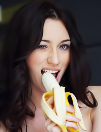 Zsanett Tormay takes all of her clothes in front of the camera and seductively eats a banana.