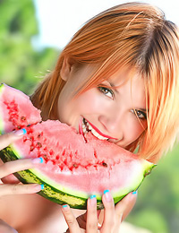 Violla A eats watermellon outdoors nude and teases us with her hot, curvy piece of ass.